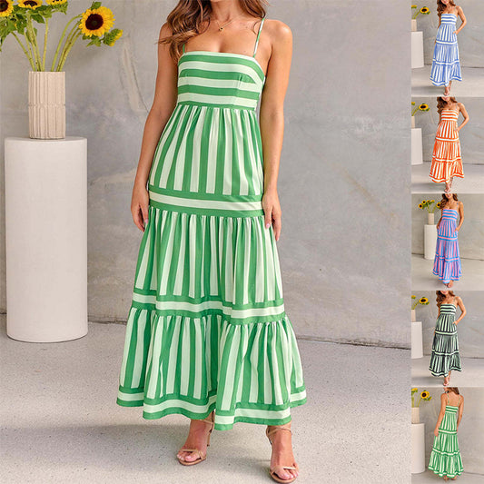 Robe longue rayée dos nu avec poches, idéale pour la plage.