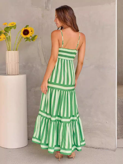 Robe longue rayée dos nu avec poches, idéale pour la plage.